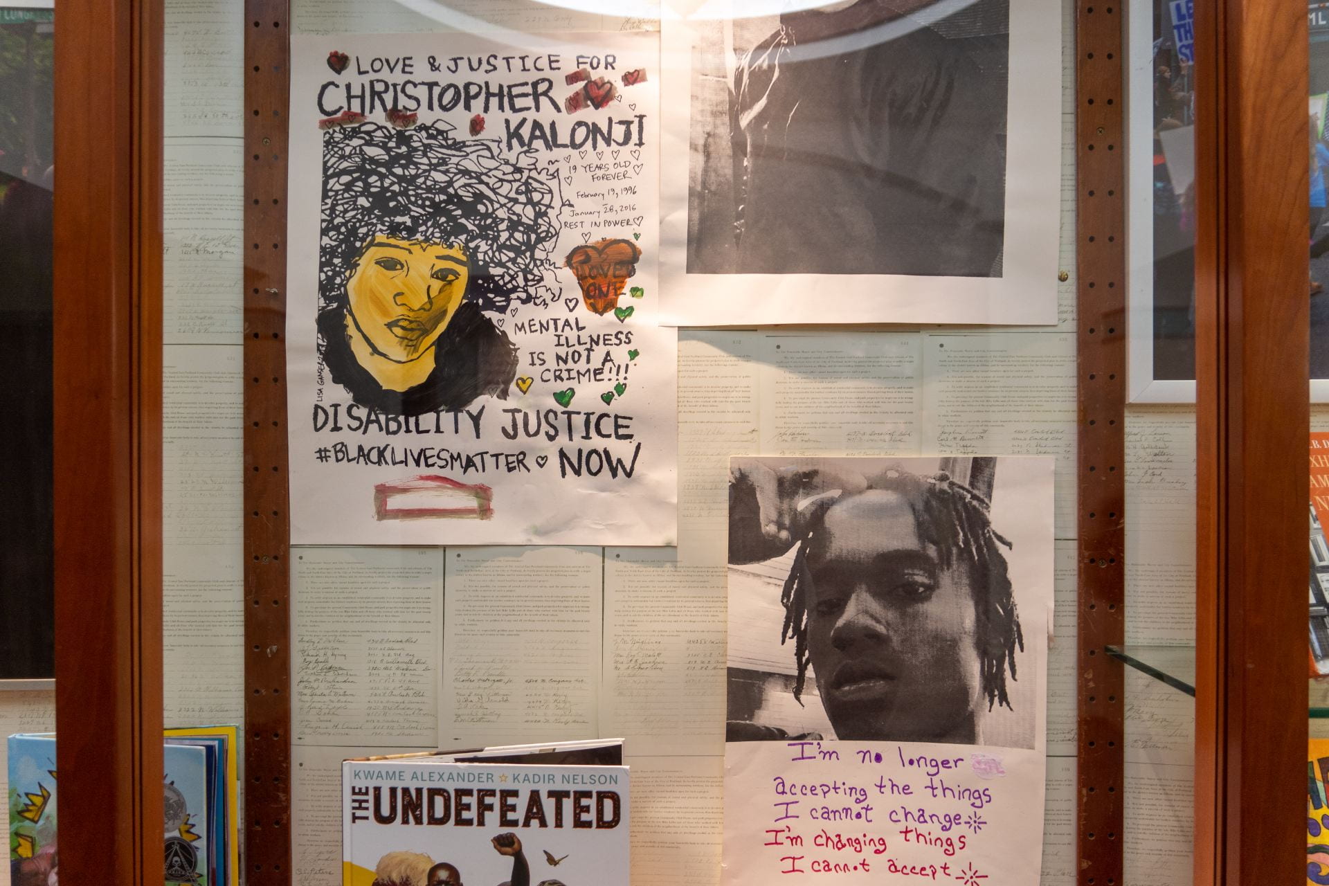 Case exhibiting Community Art projects, specifically honoring young Black Lives lost due to social injustice and inequity